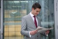 man reads newspaper