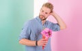 Man ready for date bring pink flowers. Boyfriend confident holds bouquet waiting for date. Guy bring romantic pleasant Royalty Free Stock Photo