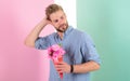 Man ready for date bring pink flowers. Boyfriend confident holds bouquet waiting for date. Guy bring romantic pleasant Royalty Free Stock Photo