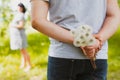 Man ready to give flowers to girlfriend Royalty Free Stock Photo