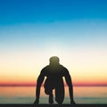 A Man, Ready To Run, Sunset, Seaside Royalty Free Stock Photo