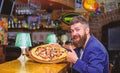 Man received delicious pizza. Enjoy your meal. Cheat meal concept. Pizza favorite restaurant food. Fresh hot pizza for Royalty Free Stock Photo