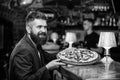 Man received delicious pizza. Enjoy your meal. Cheat meal concept. Hipster hungry eat italian pizza. Pizza favorite