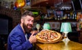 Man received delicious pizza. Enjoy your meal. Cheat meal concept. Pizza favorite restaurant food. Fresh hot pizza for Royalty Free Stock Photo