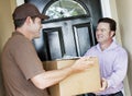 Man Receives Package Delivery Royalty Free Stock Photo