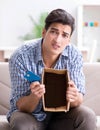 Man receiving empty parcel with stolen goods Royalty Free Stock Photo