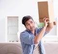 Man receiving empty parcel with stolen goods Royalty Free Stock Photo