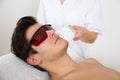 Man Receiving Laser Hair Removal Treatment