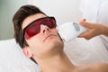 Man Receiving Laser Hair Removal Treatment Royalty Free Stock Photo