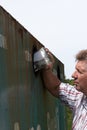 Man recycling glass