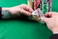 Man with ace up his sleeve. Cheating at poker