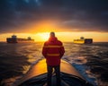 Man in a red blazer standing his back to camera. Dock worker looking at two big loaded trading ships sailing away. Generative AI Royalty Free Stock Photo