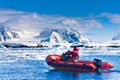 Man in the red boat Royalty Free Stock Photo