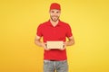 Man red cap yellow background. Delivering purchase. Faster than you can imagine. Delivered to your destination. Service