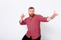 Man with red hair and beard in plaid shirt Royalty Free Stock Photo