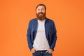 Man With Red Hair And Beard Posing Over Orange Background Royalty Free Stock Photo