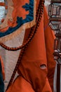 Man with red hood. Nazarene from Semana Santa catholic parade in Caceres, Spain