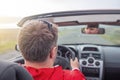 A man driving a car rushes along the highway. Royalty Free Stock Photo