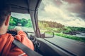 A man driving a car rushes along the highway. Royalty Free Stock Photo