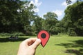 Man with a red marker at Tiergarten park in Berlin