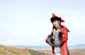 Man in red Mongolian costume