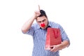 Man with a red nose funny holding a shopping bag gift present is