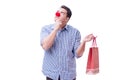 Man with a red nose funny holding a shopping bag gift present is Royalty Free Stock Photo