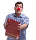 Man with a red nose funny holding a shopping bag gift present is