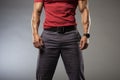 A Man In A Red Shirt And Black Pants