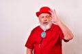 Man with red shirt and bowler inspecting a bitcoin Royalty Free Stock Photo