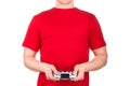 Man in red t-shirt holding gamepad and playing video games isolated white Royalty Free Stock Photo