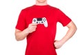 Man in red t-shirt holding gamepad and playing video games isolated white Royalty Free Stock Photo