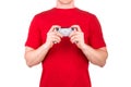 Man in red t-shirt holding gamepad and playing video games isolated white Royalty Free Stock Photo