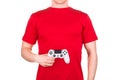 Man in red t-shirt holding gamepad and playing video games isolated white Royalty Free Stock Photo