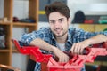 Man with red toolbox Royalty Free Stock Photo