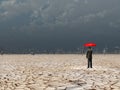 Man with red umbrella Royalty Free Stock Photo