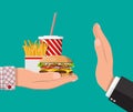 Man refuses take fast food with hand gesture Royalty Free Stock Photo