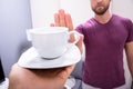 Man Refusing Cup Of Coffee Royalty Free Stock Photo