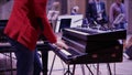 Man Rehearse Playing Music on the Piano Keyboard on Jazz Concert 4K