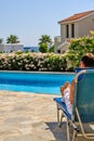 Man relax on deck chair Royalty Free Stock Photo