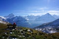 Man relax resting on seating after climbing the snow moutain wit