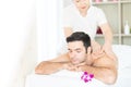 Man relax in skin care aroma therapy and scrub spa, in Thailand resort Royalty Free Stock Photo