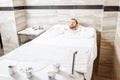 Man relaxing at the bath with carbon dioxide Royalty Free Stock Photo