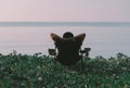 Man relaxing on the beach, back view, healthy and vacation. Royalty Free Stock Photo