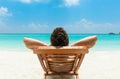 Man relaxing on beach Royalty Free Stock Photo