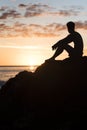 man relaxing beach sunset. High quality photo Royalty Free Stock Photo