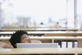 Man relaxing behind office desk Royalty Free Stock Photo