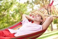 Man Relaxing In Hammock Royalty Free Stock Photo