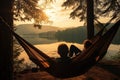 Man relaxing in hammock on the lake at sunrise. View from the window, person view couple resting at camping woman laying in
