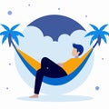 A man is relaxing in a hammock under a palm tree Royalty Free Stock Photo